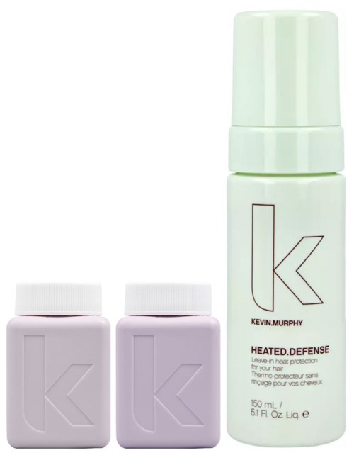 Two bottles labeled 'Kevin Murphy' and a spray bottle, likely hair care products.