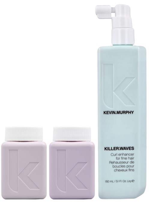 A product bottle with two small containers and a taller spray bottle, all labeled Kevin.Murphy, for hair styling.