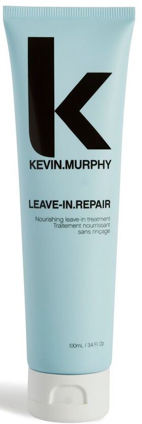 Vaaleansininen putki, jossa suuri musta "K" ja teksti Kevin Murphy Leave-In Repair -hiushoitoon.