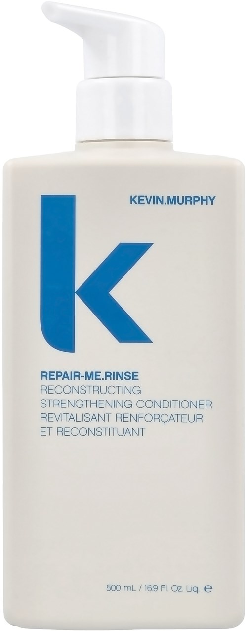 Valkoinen pumppupullo, jossa lukee Kevin.Murphy Repair-Me.Rinse hoitoaine sinisellä tekstillä.