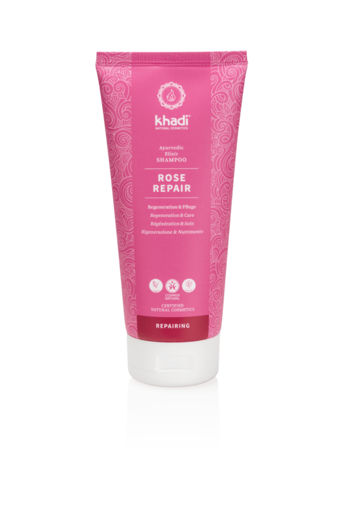 Rosa tube med Khadi Rose Repair sjampo og hvit lokk. Teksten beskriver reparasjon og naturlige ingredienser.