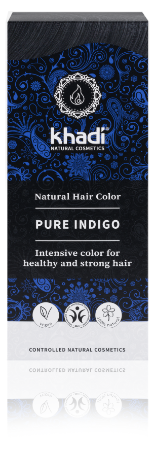 A box of hair dye labeled 'Pure Indigo,' designed for healthy, strong hair, with symbols for natural ingredients.