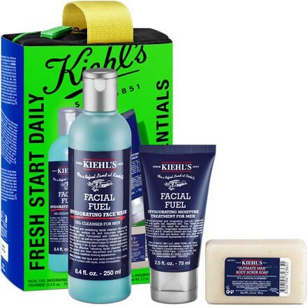 A set of skincare products including facial cleanser, moisturizer, soap, and a bag, all from Kiehl's.
