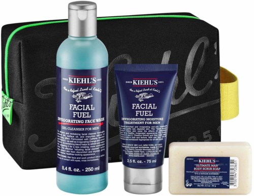 Set of men's skincare products including face wash, moisturizer, and soap in a black and yellow bag.