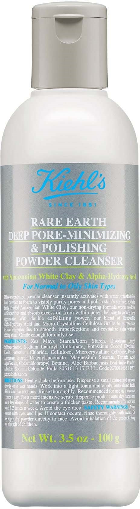 A white bottle with a gray cap containing Kiehl's Rare Earth Deep Pore-Minimizing & Polishing Powder Cleanser.
