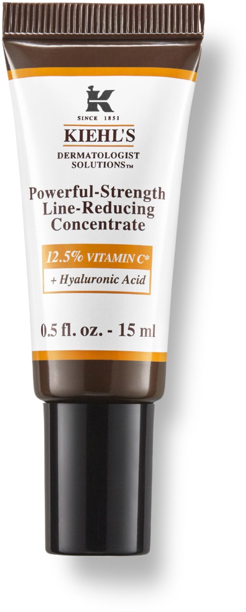 A tube of Kiehl's skincare product with white, brown, and orange packaging, labeled as a strength-reducing concentrate with vitamin C.