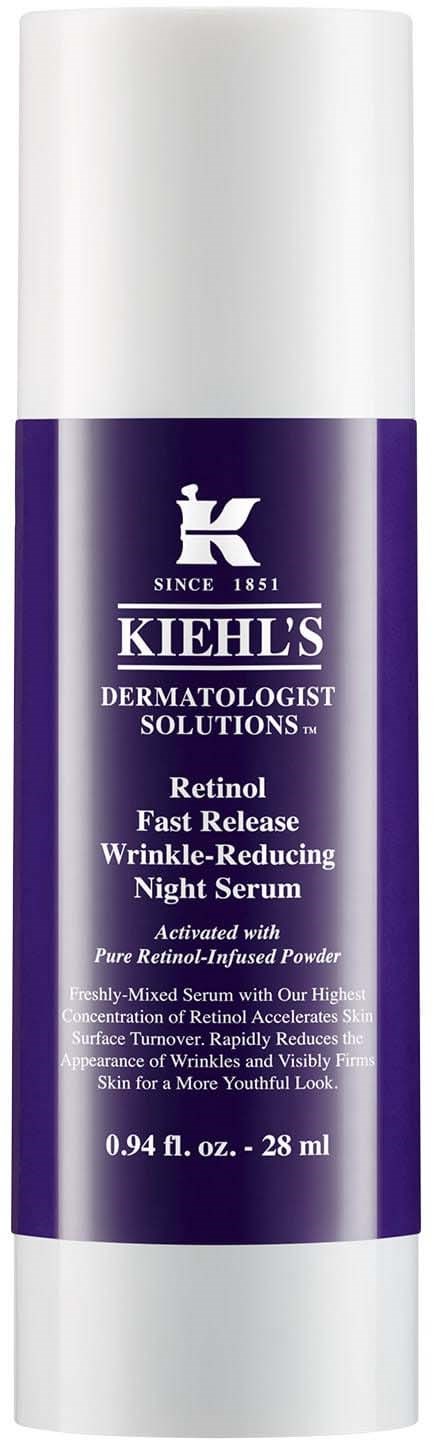 A purple and white bottle of Kiehl's Retinol Night Serum for reducing wrinkles and signs of aging.