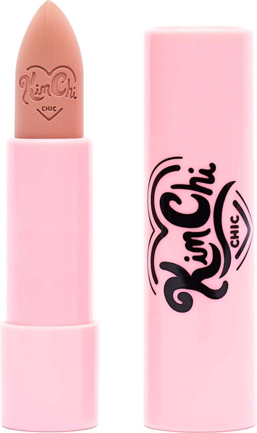 A pink lipstick tube with a beige lipstick showing a brand logo engraved on it.