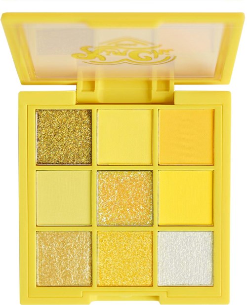 Yellow eyeshadow palette with nine glittery and matte shades, arranged in three rows of three.