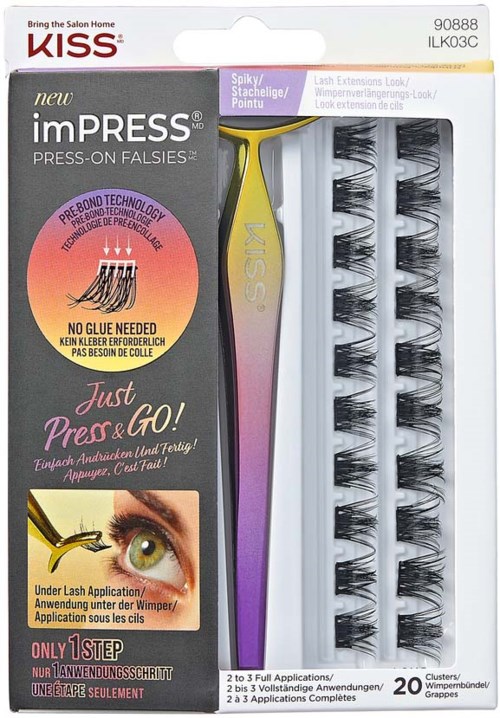 A lash extension kit with a yellow tool and multiple rows of false eyelashes in a box.