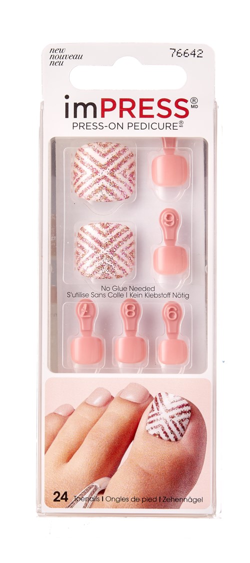 A package of imPRESS press-on pedicure nails with chevron pattern and tools for application.