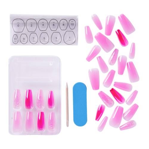 Nagelkonstuppsättning innehåller rosa konstnaglar, en blå pinne, ett vitt verktyg och nagelnummerklistermärken.