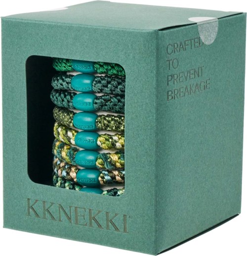 Colorful hairbands with blue beads in a green box with clear window.