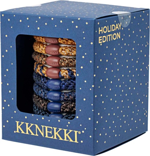 Box of colorful braided hair ties labeled Holiday Edition with KKNEKKI logo.