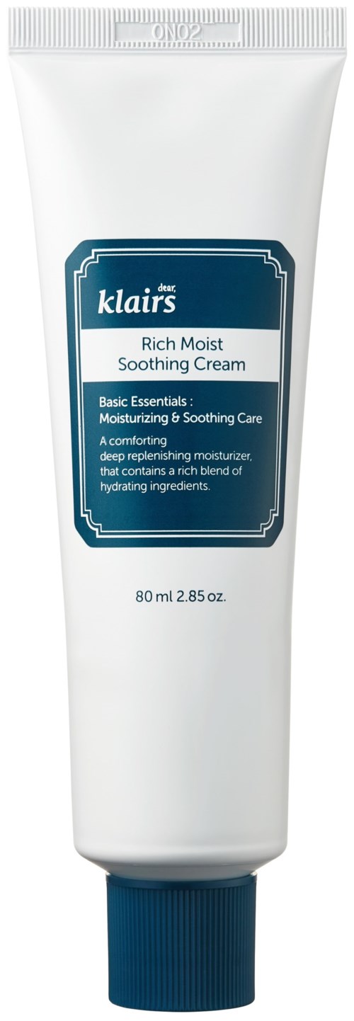 A white tube with a blue cap holds Klairs Rich Moist Soothing Cream, designed for moisturizing and soothing skin. Text on the tube describes its benefits.