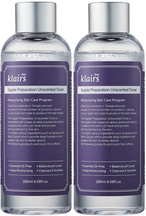 Twee flessen Klairs Unscented Toner voor hydraterende huidverzorging. Heldere vloeistof, paarse etiketten en zilverkappen.