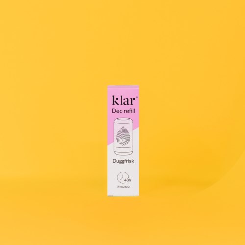 Klar deodorantfylling på en gul bakgrunn. Den beskytter i 48 timer.