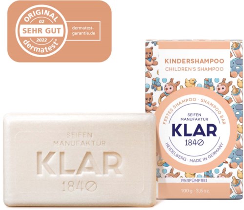 En børne shampoo æske med bjørne ansigter og en soap bar med KLAR logo og produktinformation.