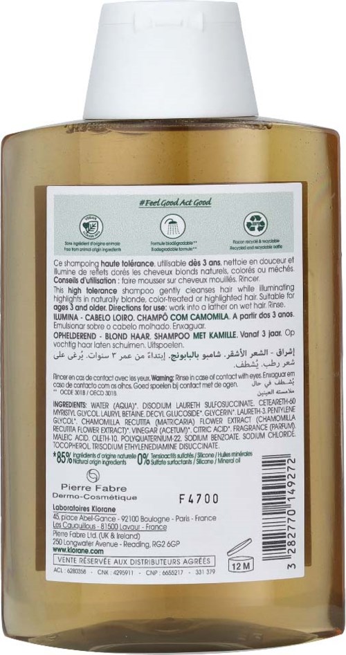 A brown bottle with a white cap and a detailed label featuring product information and ingredients.