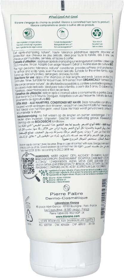 A white tube with detailed instructions, symbols, and product information, likely a cosmetic or skincare product.