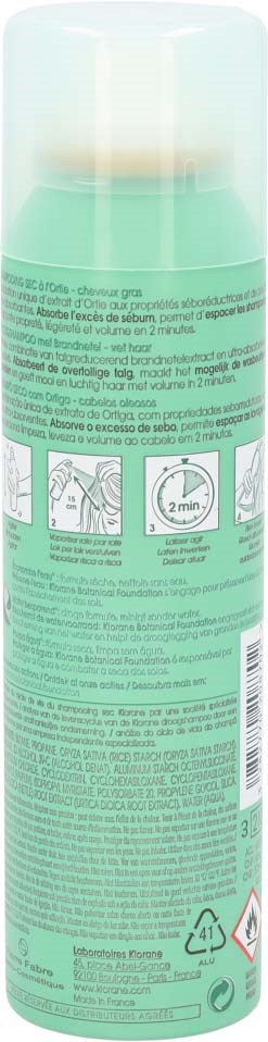 A green spray can with instructions, a logo, and safety symbols, likely for cleaning or household use.