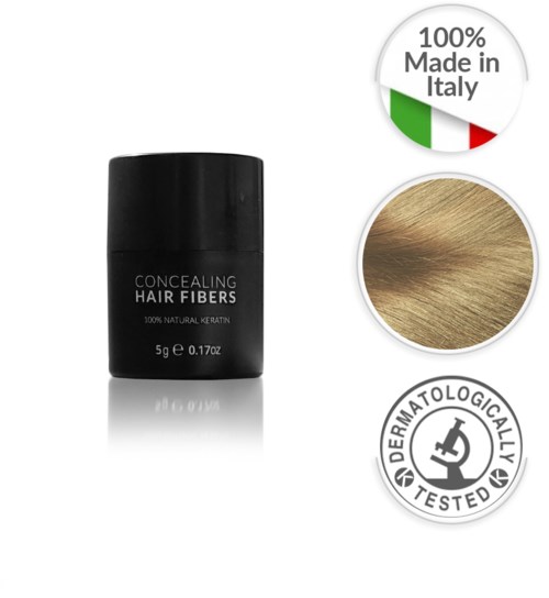 En svart behållare med etiketten 'Concealing Hair Fibers', ett litet prov på blond hår, gjort i Italien och dermatologiskt testat.