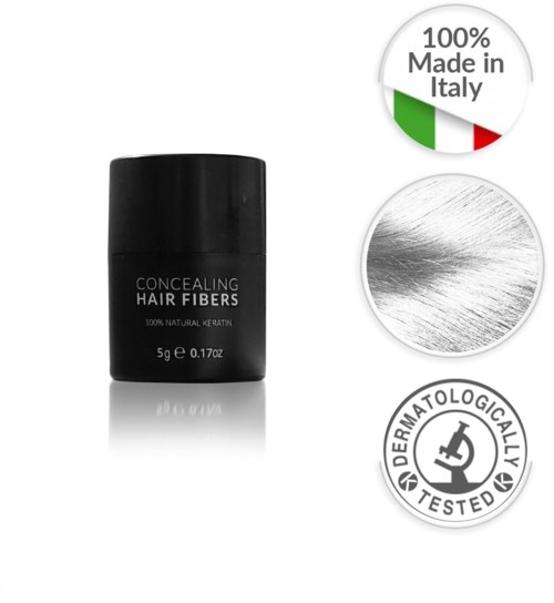 En liten svart behållare märkt "Concealing Hair Fibers" med ikoner som visar att den är tillverkad i Italien, naturlig keratin och dermatologiskt testad.