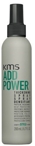 Biała butelka spray z czarnym zamkiem, oznaczona KMS ADD POWER, używana do zagęszczania i układania włosów.