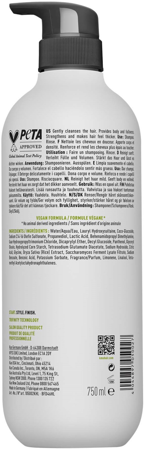 Een witte fles met een zwart pompje, gemarkeerd met verschillende producten, ingrediënten en een barcode aan de achterkant.