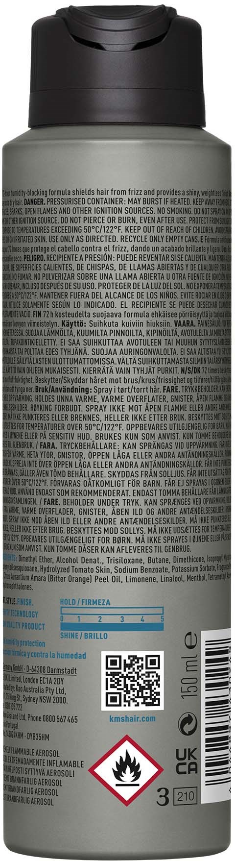 En sylinderformet spraydåse med sort låg, dækket af lille tekst, sikkerhedsadvarsler og en QR-kode.