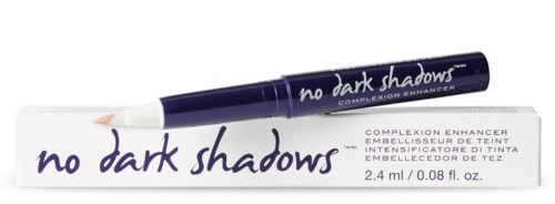 A white tube with purple writing and a dark purple pen. The pen is placed on a white box.
