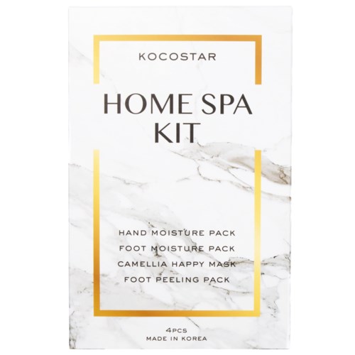 En hvid pakke med gyldne kanter og sort og guld tekst. Den siger "HOME SPA KIT" med en liste over produkter indeni.