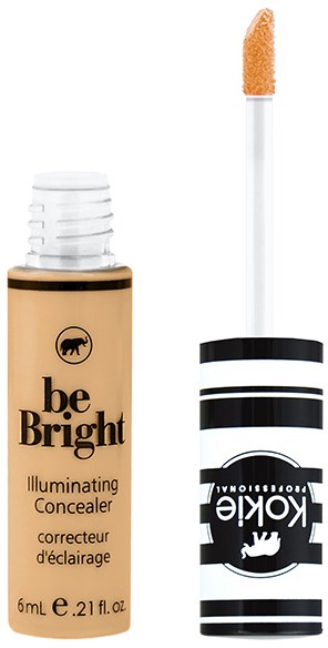 Ett beige concealer-rör med vit kork, svart text och svart logotyp, med en applikator bredvid.