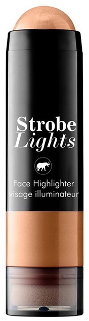 En svart förpackning av highlighter med en beige färgad produkt inuti, märkt 'Strobe Lights Face Highlighter'.