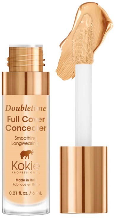 En beige farget flytende foundation med en hvit applikatorstang, i en gullkapslet flaske. Produktet heter 'Doubletone Full Cover Concealer'.