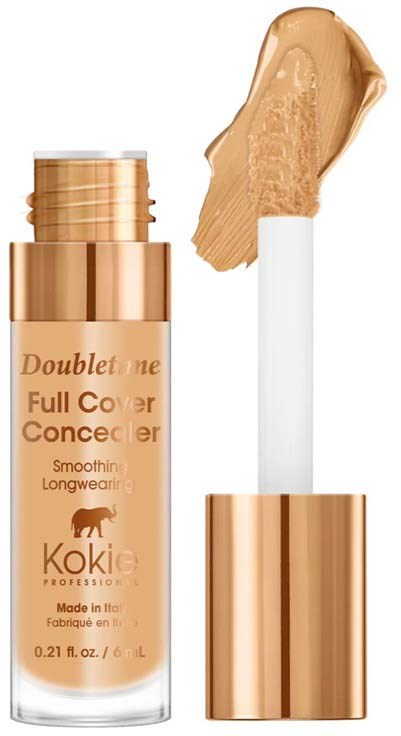 En beige concealerstift med hvit håndtak og rosegullhette, med produktet smurt på toppen.