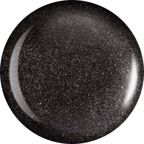 A black, round object with tiny white specks, looks like a starry night sky or a cosmic scene.