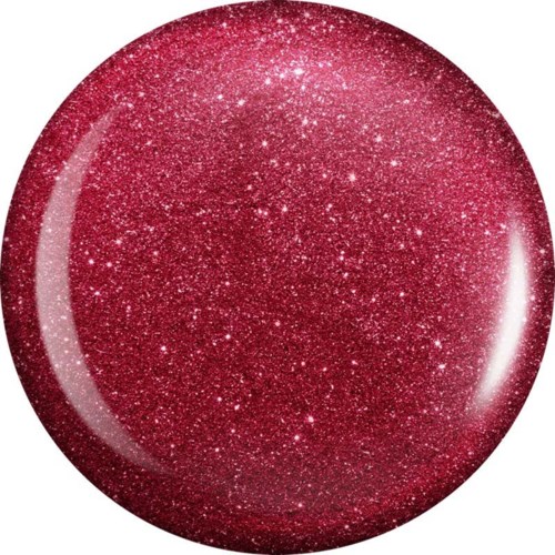 En skinnende, rød, glitteraktig kule med mange små glitrer inni.