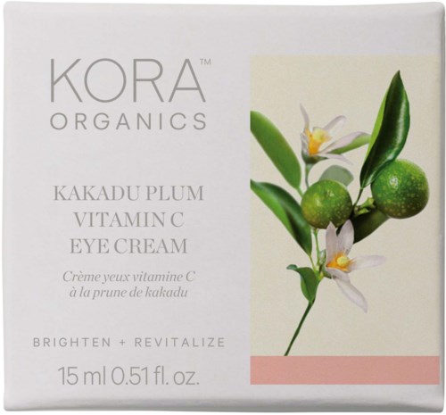 A box of KORA Organics Kakadu Plum Vitamin C Eye Cream with green fruit and white flowers on the packaging.