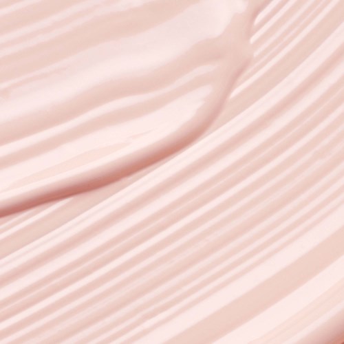 Soft peach-colored fabric with gentle folds and streaks, smooth texture and flowing appearance.