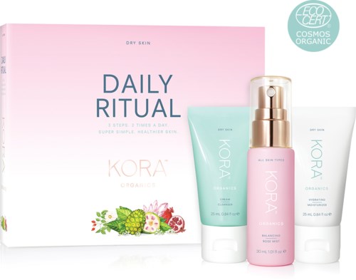 Kora Organics för torr hud med en låda, kräm, serum och återfuktare, alla märkta som ekologiska och miljövänliga.