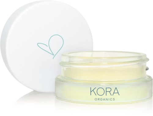 En burk Kora Organics-kräm med ett vitt lock som har en enkel grön hjärtlogo.