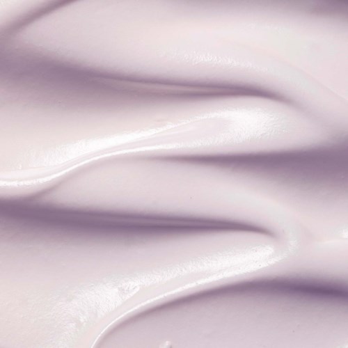 Soft, flowing lavender-colored fabric with gentle folds and a shiny surface.
