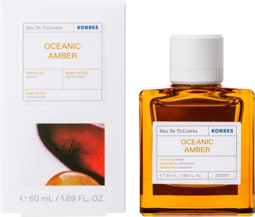 Pieni meripihkan värinen hajustepullo ja siihen kuuluva laatikko, etiketissä Oceanic Amber.