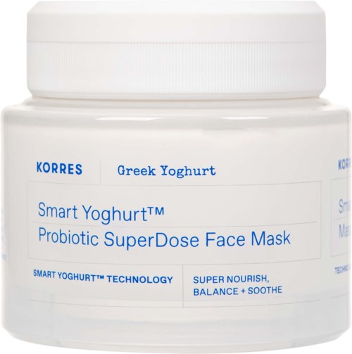 Ein weißer Behälter mit griechischem Joghurt Gesichtsmaske, blauer Text und weißer Deckel.