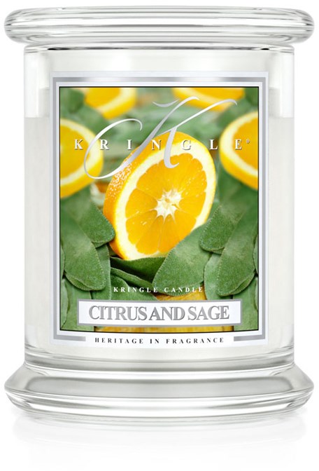 En ljuslykta med bild av skivor av citron och gröna blad, märkt 'Citrus and Sage' och 'Heritage in Fragrance.'