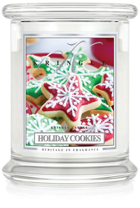 Färgglada julkakor formade som stjärnor och julgranar i en burk. Etiketten säger "Holiday Cookies" och "Heritage in Fragrance."
