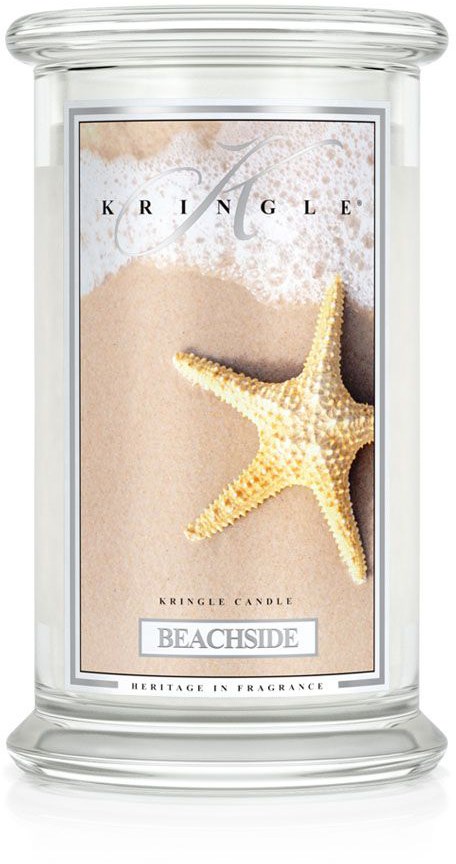 Et lys med en sjøstjerne på sandbakgrunn, merket 'Beachside' og 'Kringler Candle'.