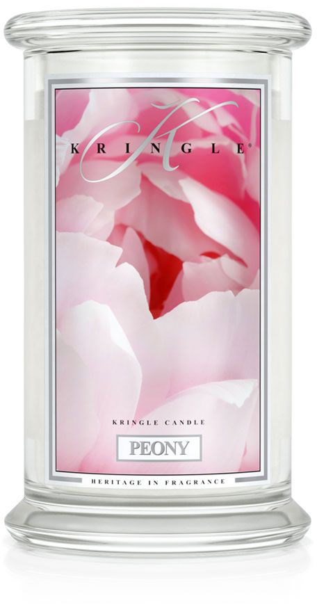 Ett ljus med en ros- och vit piondesign, märkt 'Peony' och 'Kringle Candle', i en tydlig glasburk.