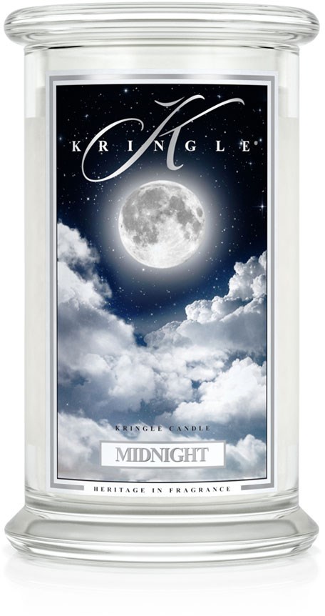 Ett ljus med namnet "Midnight" med måne och moln på etiketten, del av en parfymserie med arv.